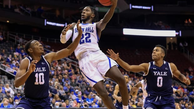 Nov 14, 2021; Newark, New Jersey, USA; Seton Hall Pirates guard Myles Cale (22) drives to the basket asYale Bulldogs guard Matthue Cotton (10) and guard Jalen Gabbidon (00) defends during the second half at Prudential Center. Mandatory Credit: Vincent Carchietta-USA TODAY Sports